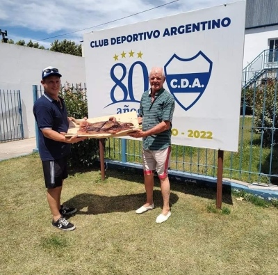 Ganadores de los lechones en la vereda del Depor